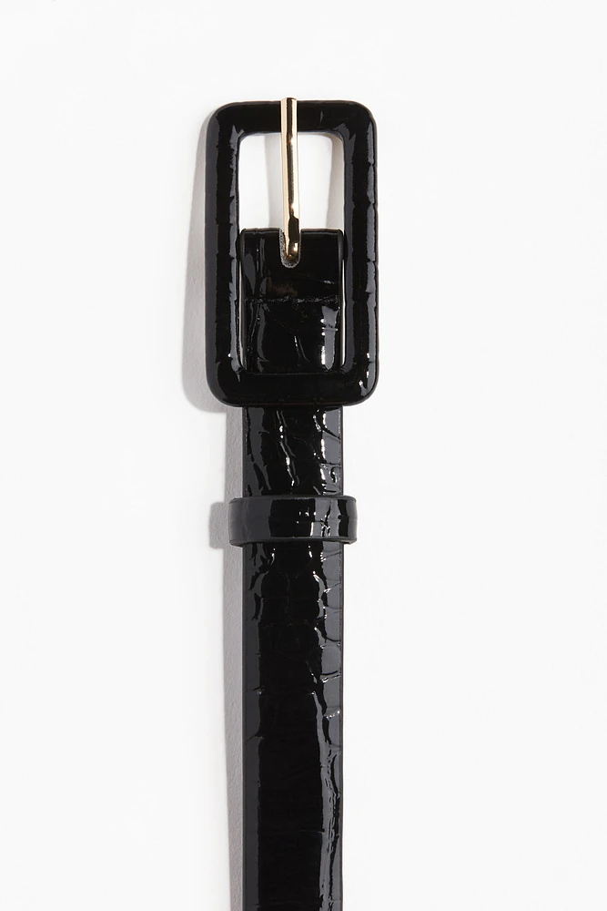 Ceinture fine avec motif en relief