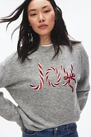 Chandail avec motif Joy