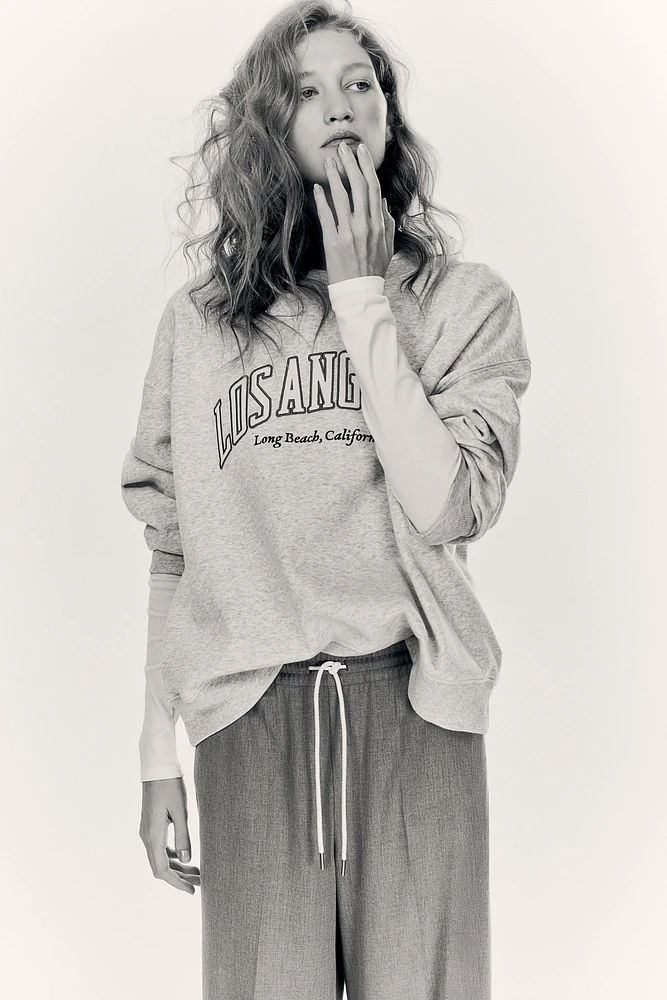 Sweatshirt with Text Motif