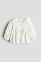 Blouse avec boucle