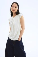 Blouse avec plis devant