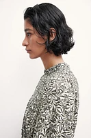 Robe avec détails en nid d'abeille