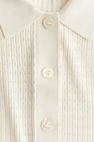 Polo en tricot pointelle