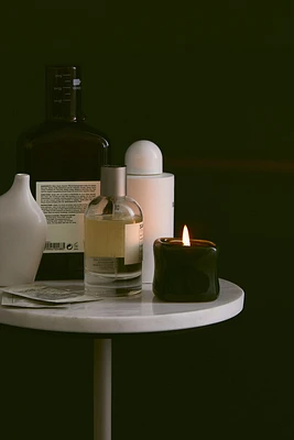 Bougie parfumée dans un pot en céramique