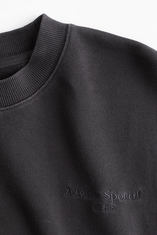 Sweatshirt with Text Motif