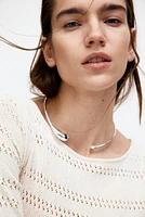 Robe en tricot ajouré avec laçage