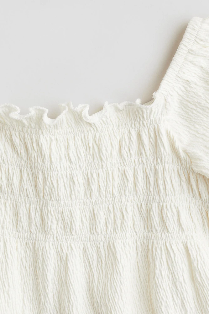 Blouse avec nid d'abeille