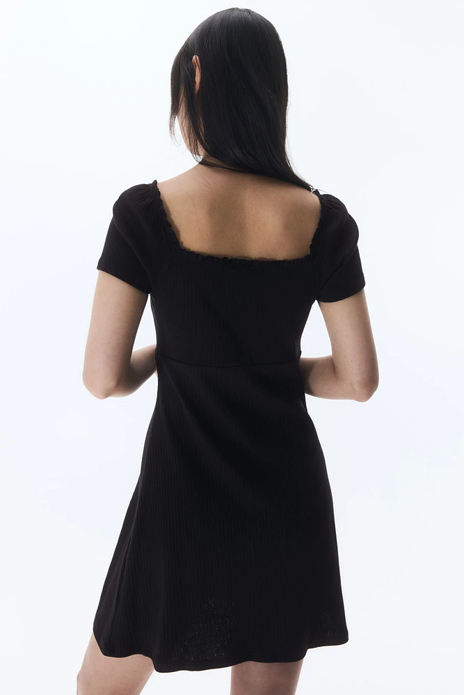 Lace-Trimmed Dress with Flared Skirt