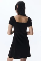 Lace-Trimmed Dress with Flared Skirt