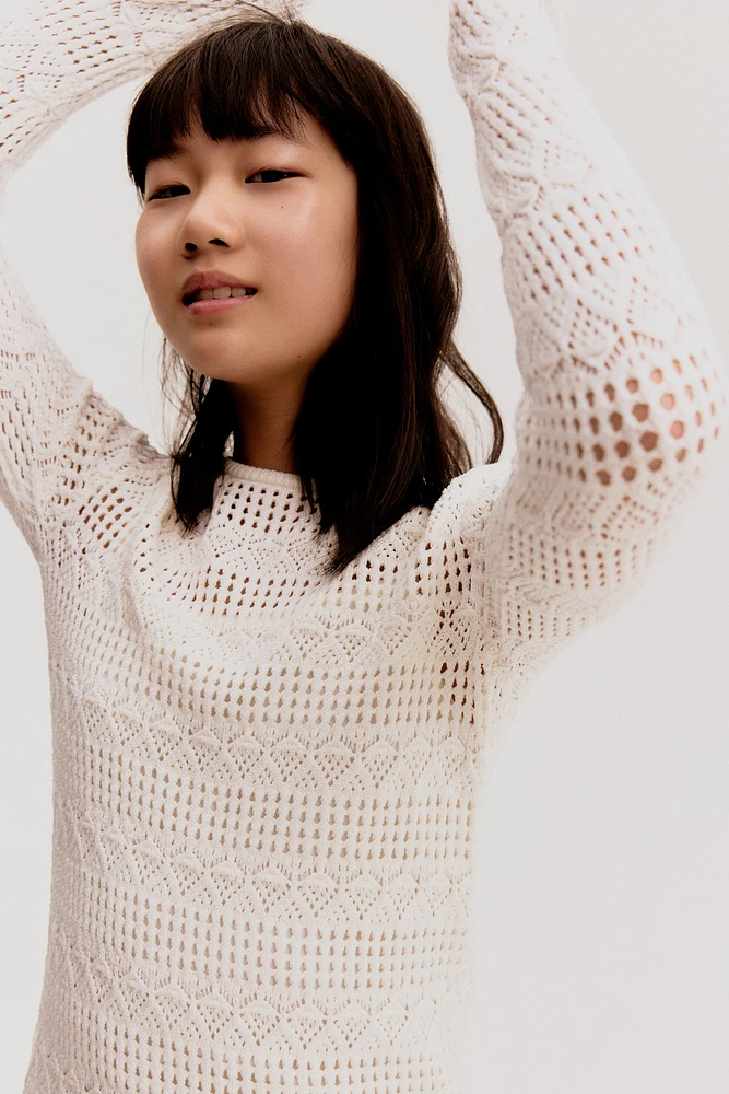 Robe d'aspect fait au crochet
