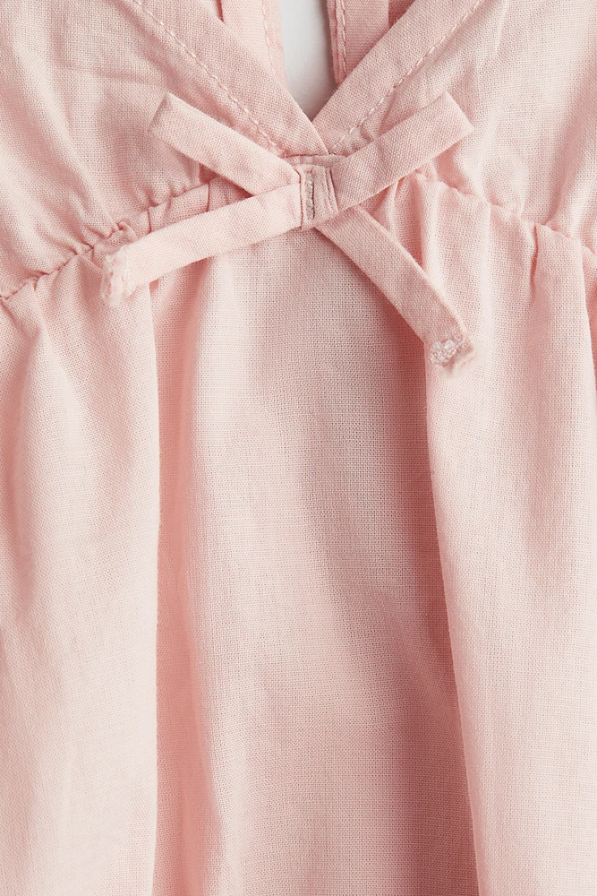 Blouse péplum en coton