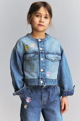 Veste en denim avec motifs brodés