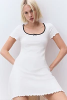 Overlocked-Trim Dress with Flared Skirt