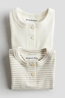 2-pack Henley Bodysuits