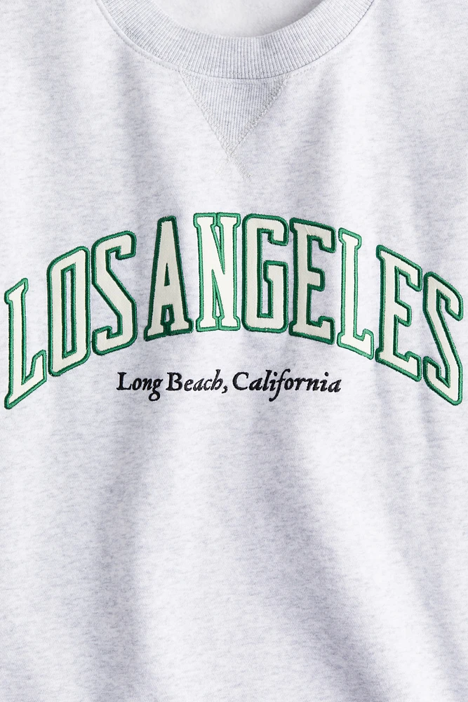 Sweatshirt with Text Motif