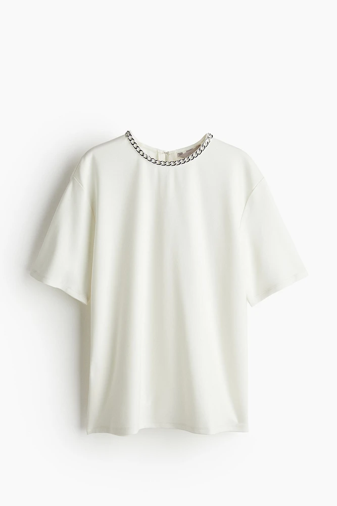 Chain-Decorated Top