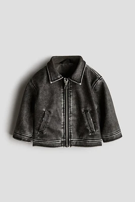 Veste en tissu enduit