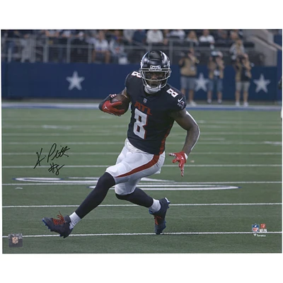 Kyle Pitts Atlanta Falcons Autographed 16" x 20" Black Jersey Running Photograph