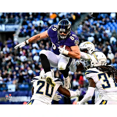 Mark Andrews Baltimore Ravens Unsigned Hurdling Defender Photograph
