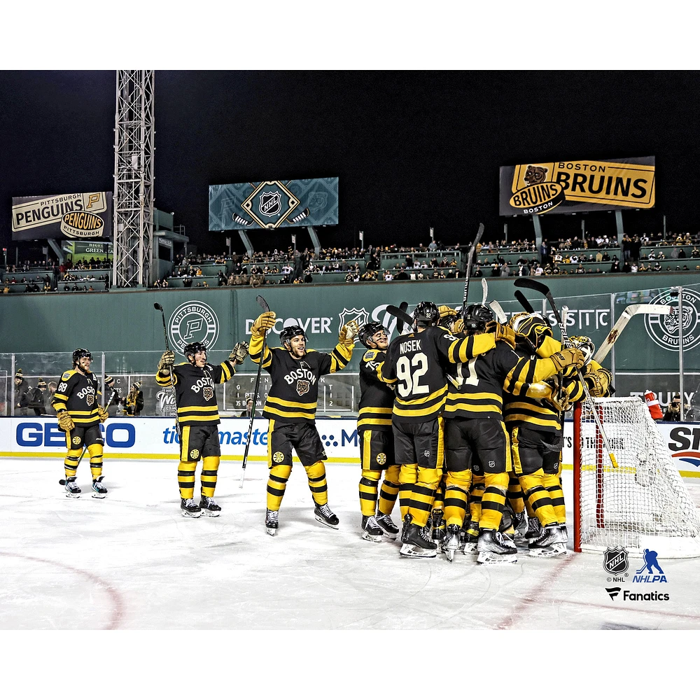 Boston Bruins Unsigned Celebrate 2-1 Win the 2023 Discover NHL Winter Classic Photograph