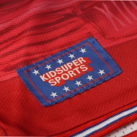 Short unisexe NBA & KidSuper Studios by Fanatics Detroit Pistons Hometown rouge
