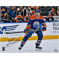 Evan Bouchard Edmonton Oilers Autographed 16" x 20" Royal Jersey Skating Photograph