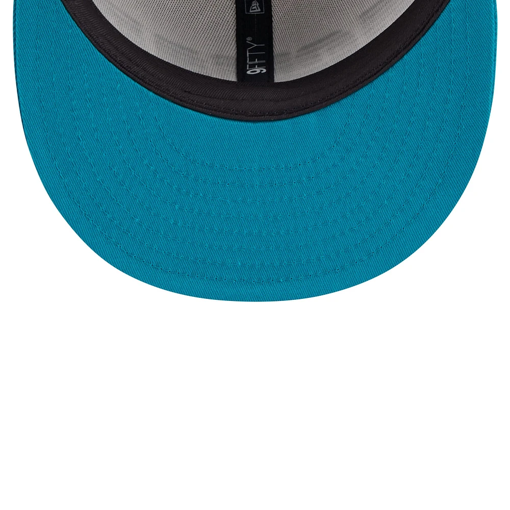 Men's New Era White/Teal Jacksonville Jaguars Throwback Space 9FIFTY Snapback Hat
