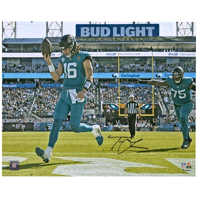 Trevor Lawrence Jacksonville Jaguars Autographed 16'' x 20'' Teal Jersey Rush Touchdown Photograph