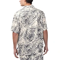Chemise boutonnée de fête à imprimé Monstera lavé au sable Margaritaville Tan Las Vegas Raiders pour hommes