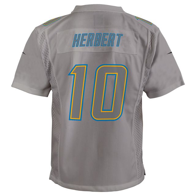 Maillot de jeu Atmosphere Los Angeles Chargers Nike Justin Herbert gris pour jeune