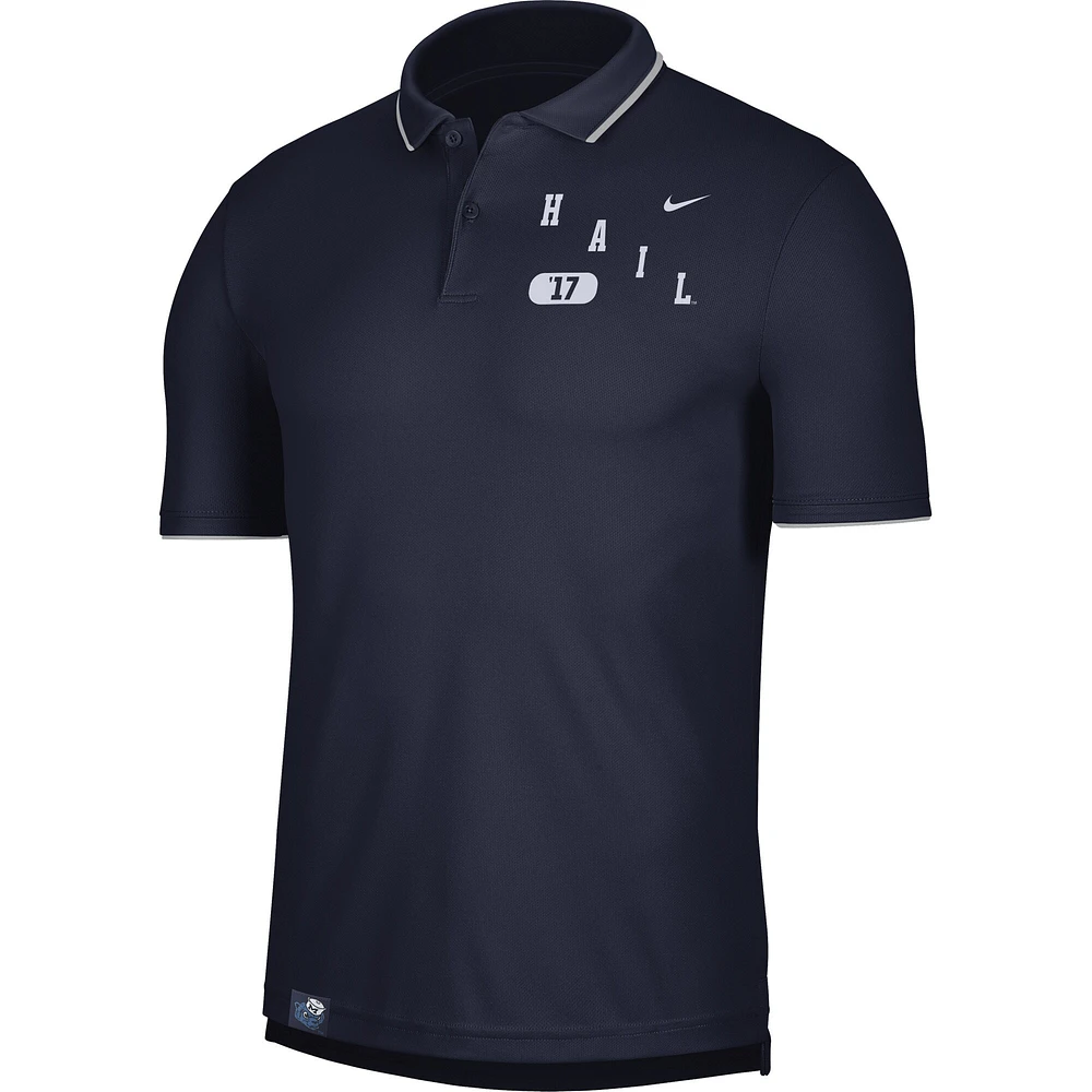 Polo de performance avec logo des Michigan Wolverines Nike pour homme, bleu marine