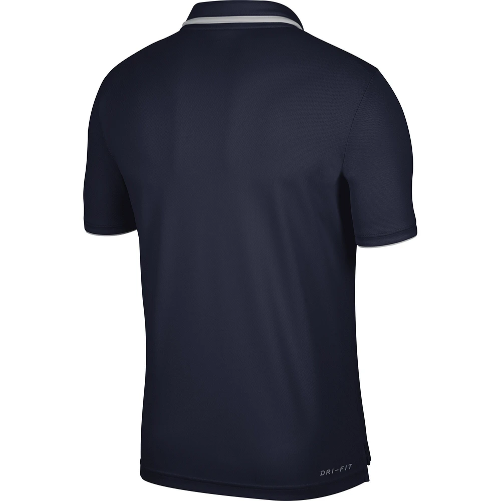 Polo de performance avec logo des Michigan Wolverines Nike pour homme, bleu marine
