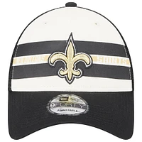 Men's New Era Cream/Black New Orleans Saints Team Stripe Trucker 9FORTY Snapback Hat