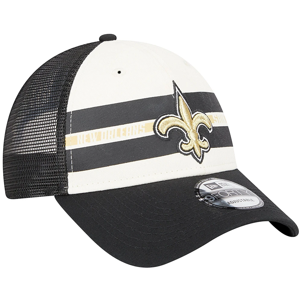 Men's New Era Cream/Black New Orleans Saints Team Stripe Trucker 9FORTY Snapback Hat
