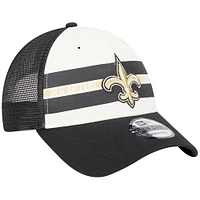 Men's New Era Cream/Black New Orleans Saints Team Stripe Trucker 9FORTY Snapback Hat
