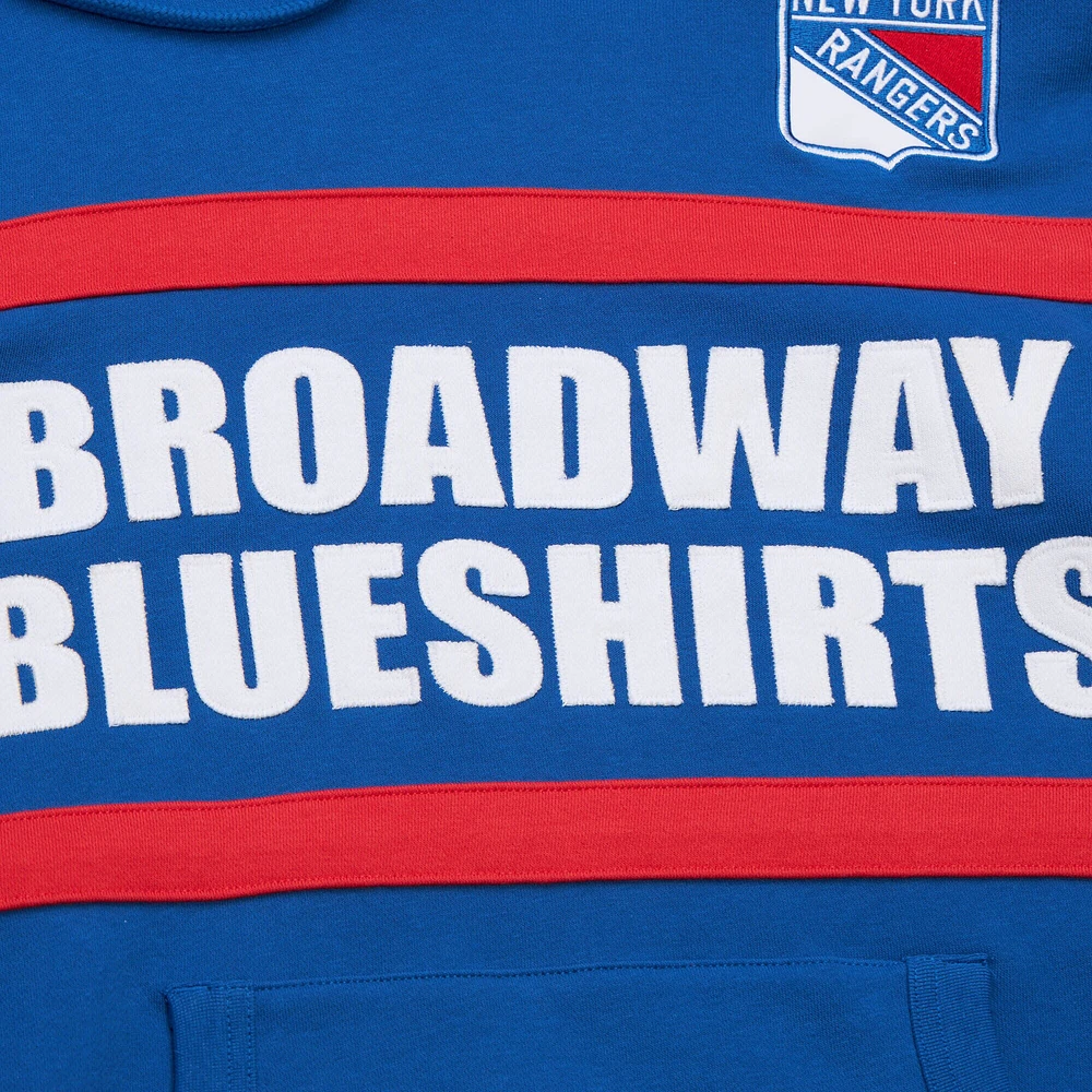 Sweat à capuche bleu Mitchell & Ness avec slogan de l'entraîneur-chef des Rangers New York pour homme