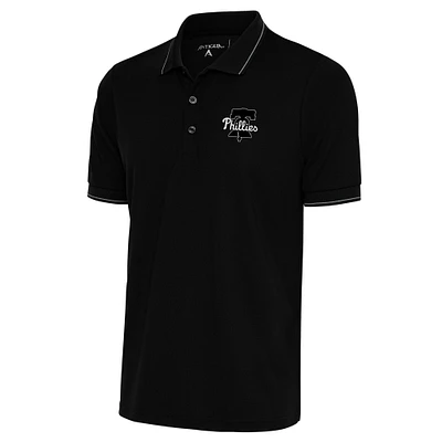 Polo Affluent métallisé noir Antigua pour homme des Philadelphia Phillies