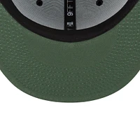 Men's New Era Green Saskatchewan Roughriders Turf Traditions 9FIFTY Snapback Hat