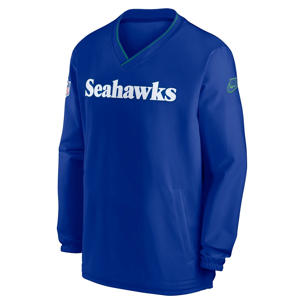 Men's Nike Royal Seattle Seahawks 2024 Sideline Throwback Logo Long-Sleeve V-Neck Windshirt