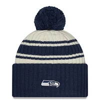 Youth New Era Cream/Navy Seattle Seahawks 2022 Sideline - Sport Cuffed Pom Knit Hat