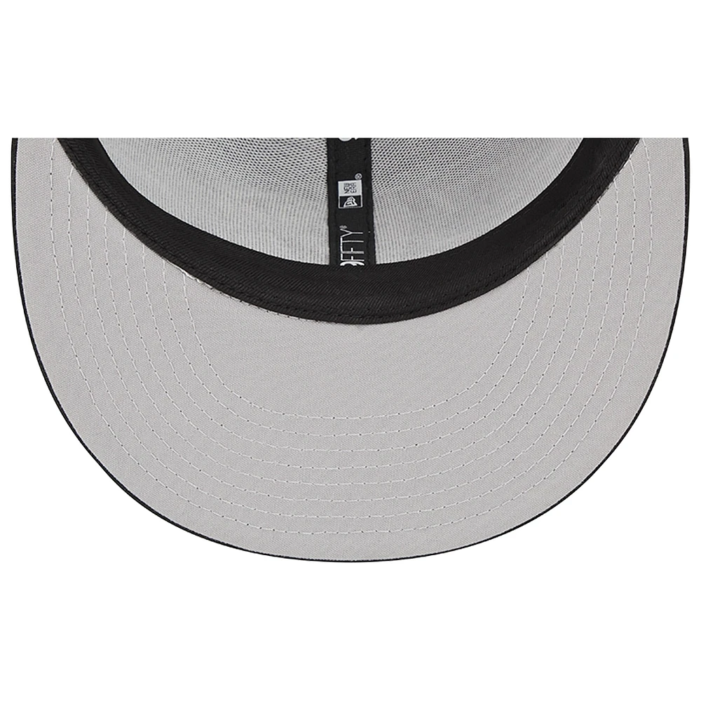 Men's New Era Black Tennessee Titans Main Trucker 9FIFTY Snapback Hat Main Trucker 9FIFTY Snapback Hat