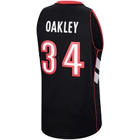 Men's Mitchell & Ness Charles Oakley Purple Toronto Raptors 1999/00 Hardwood Classics Swingman Jersey