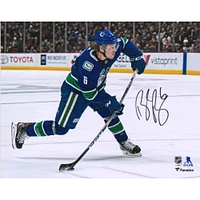 Brock Boeser Vancouver Canucks Autographed 8" x 10" Blue Jersey Shooting Photograph