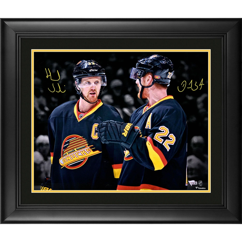 Daniel Sedin and Henrik Sedin Vancouver Canucks Framed Autographed 16" x 20" Throwback Jersey Spotlight Photograph