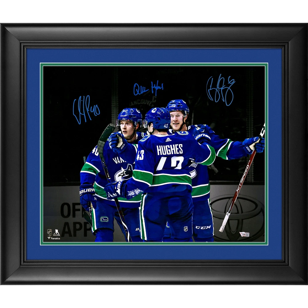 Elias Pettersson Brock Boeser & Quinn Hughes Vancouver Canucks Framed Autographed 16" x 20" Spotlight Photograph