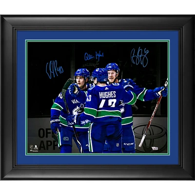 Elias Pettersson Brock Boeser & Quinn Hughes Vancouver Canucks Framed Autographed 16" x 20" Spotlight Photograph