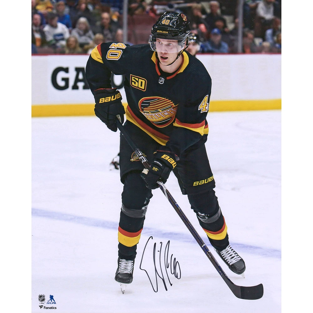 Elias Pettersson Vancouver Canucks Autographed 16" x 20" Black Alternate Jersey Skating Photograph