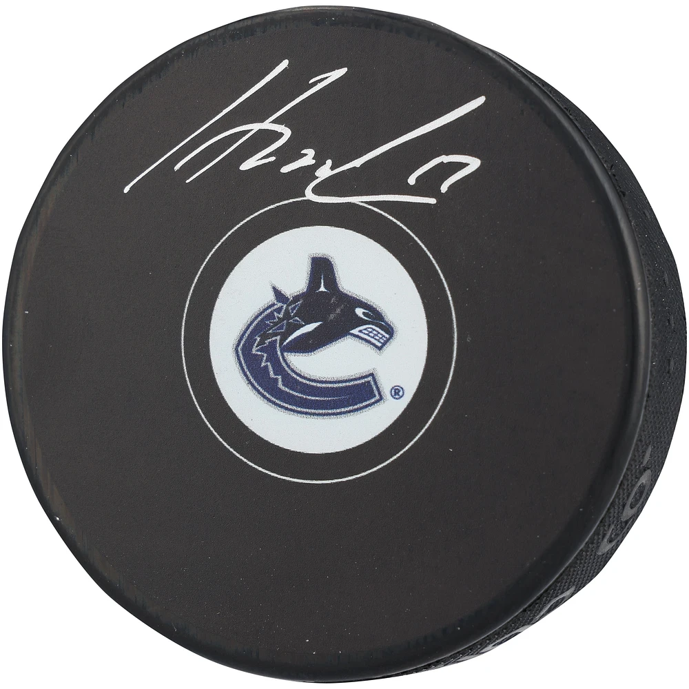 Filip Hronek Vancouver Canucks Autographed Hockey Puck 