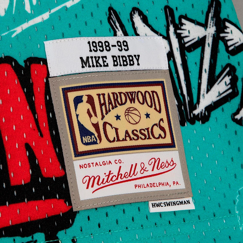 Men's Mitchell & Ness Mike Bibby Turquoise Vancouver Grizzlies 1998/99 Hardwood Classics Slap Sticker Swingman - Jersey