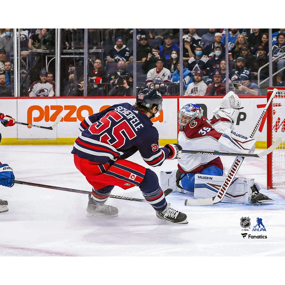 Mark Scheifele Winnipeg Jets Unsigned Shoots Puck Past Goaltender Pavel Francouz Photograph